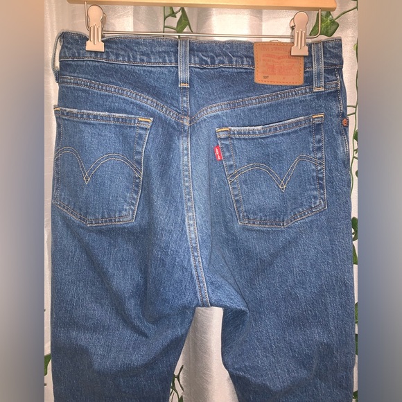 Levi’s ankle jeans with sight distressing at the bottom. - Picture 2 of 3